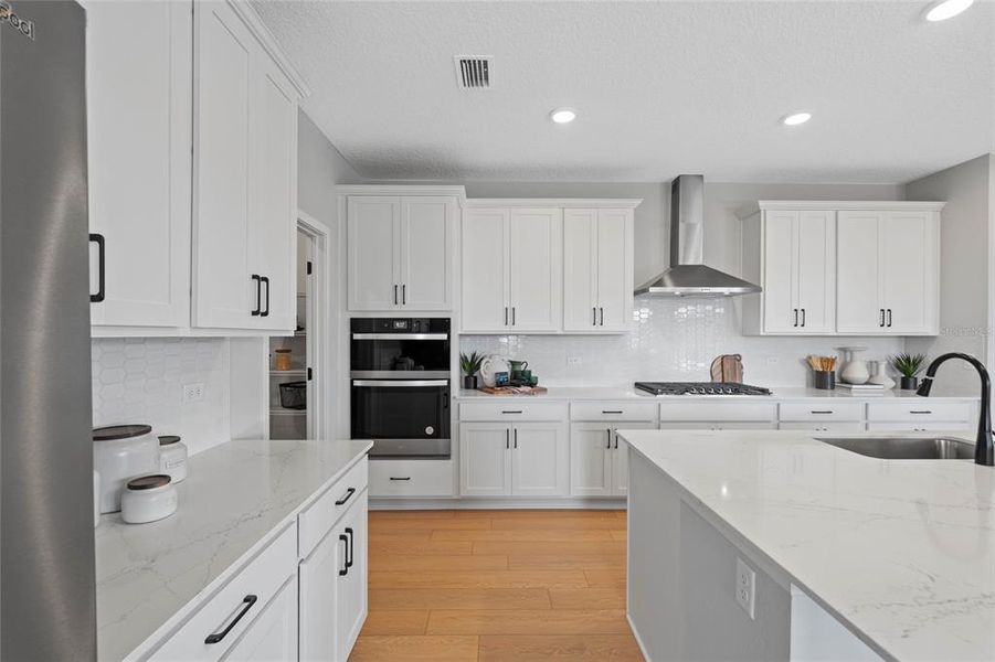 Furnished interior view inside a new home in The Cypress Series at Reserve East, Flagler Beach (Image 5).