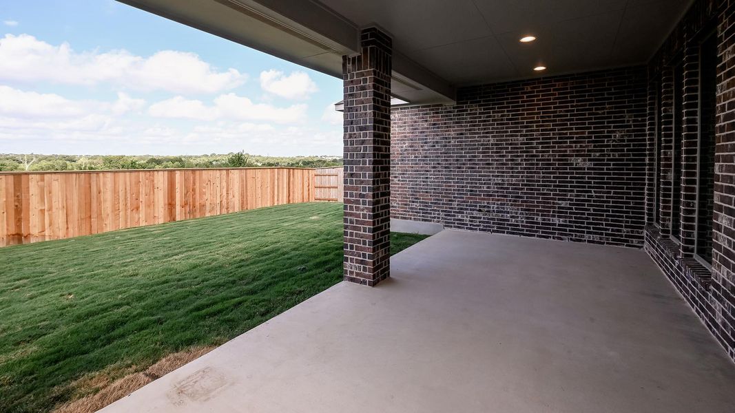 Exterior details and patio area of a home in Crosswinds, Kyle (Image 4).