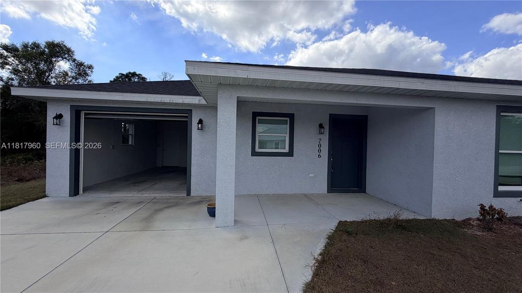 Exterior details and patio area of a home in , Sebring (Image 26).