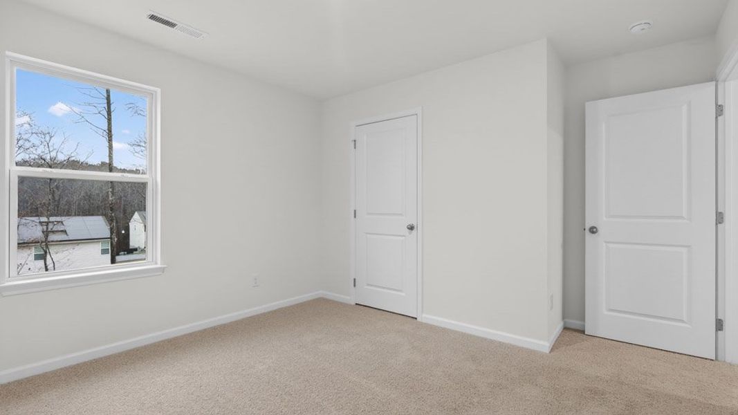 Spacious, unfurnished interior of a new home in Mangum Farms, Stem (Image 19).