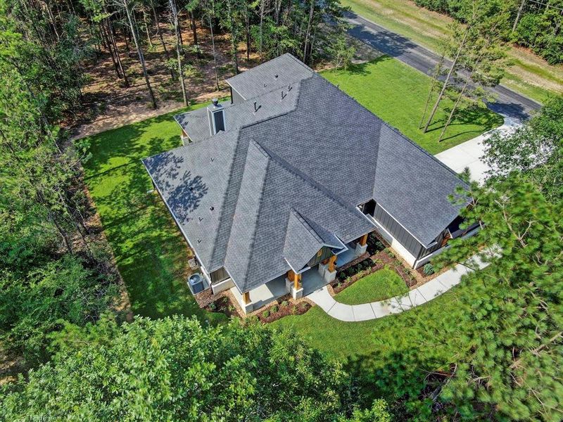 From this aerial view of the home, you can fully appreciate its beauty, elegance, and remarkable charm.