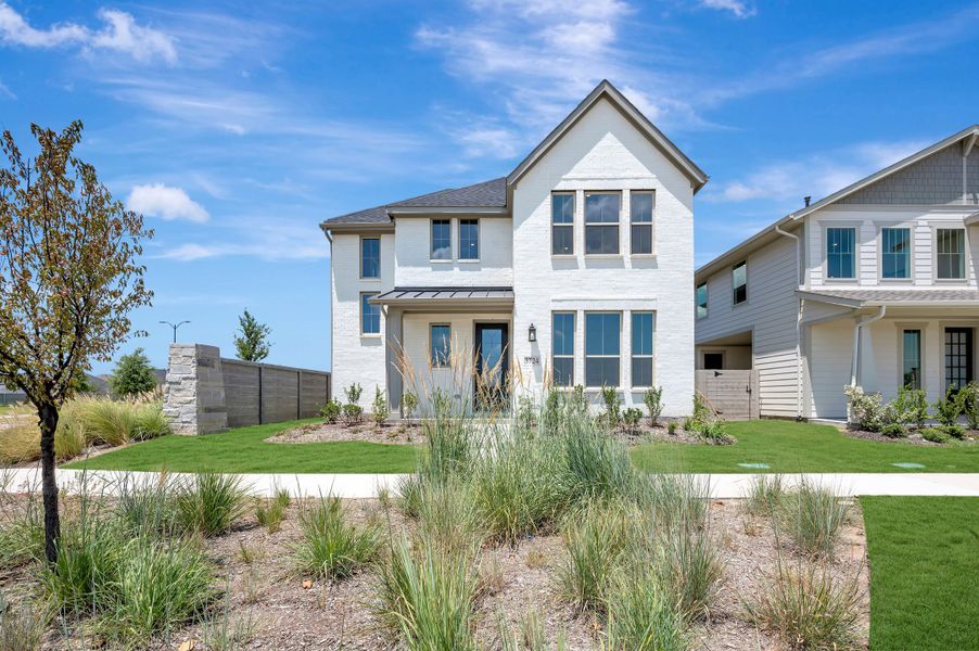 Front exterior of a new home in Painted Tree, McKinney, TX, highlighting curb appeal (Image 1). Front exterior of a new home in Painted Tree, McKinney, TX, highlighting curb appeal (Image 1).