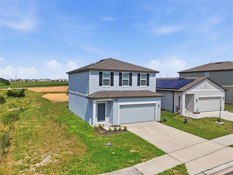 Front exterior of a new home in , Lake Hamilton, FL, highlighting curb appeal (Image 2). Front exterior of a new home in , Lake Hamilton, FL, highlighting curb appeal (Image 2).