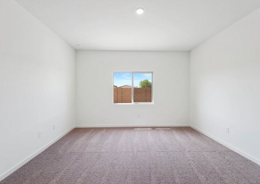 The master bedroom has all the space for your king-sized furniture.