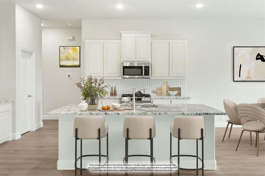 Kitchen with large granite island, three bar stools, white cabinets, and stainless steel appliances Kitchen with large granite island, three bar stools, white cabinets, and stainless steel appliances