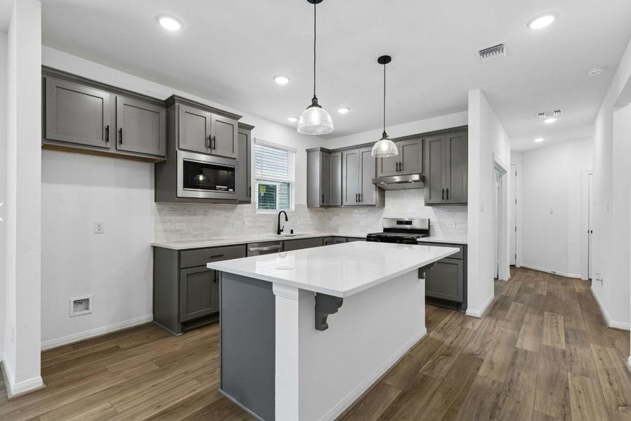 Furnished interior view inside a new home in Del Webb in Chambers Creek, Willis (Image 7).