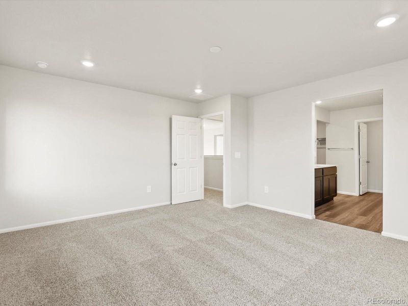 Spacious, unfurnished interior of a new home in Poudre Heights: The Lakes Collection, Windsor (Image 20).