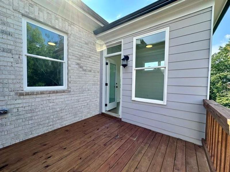 Exterior details and patio area of a home in Ward's Crossing Townhomes, Johns Creek (Image 19). Exterior details and patio area of a home in Ward's Crossing Townhomes, Johns Creek (Image 19).