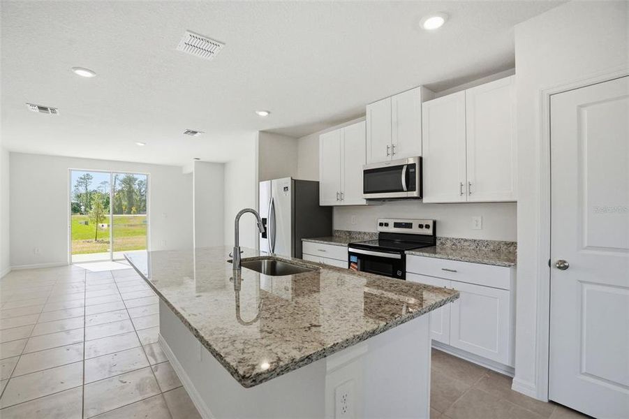 Furnished interior view inside a new home in Leyland Preserve - Premier Series, Brooksville (Image 19).