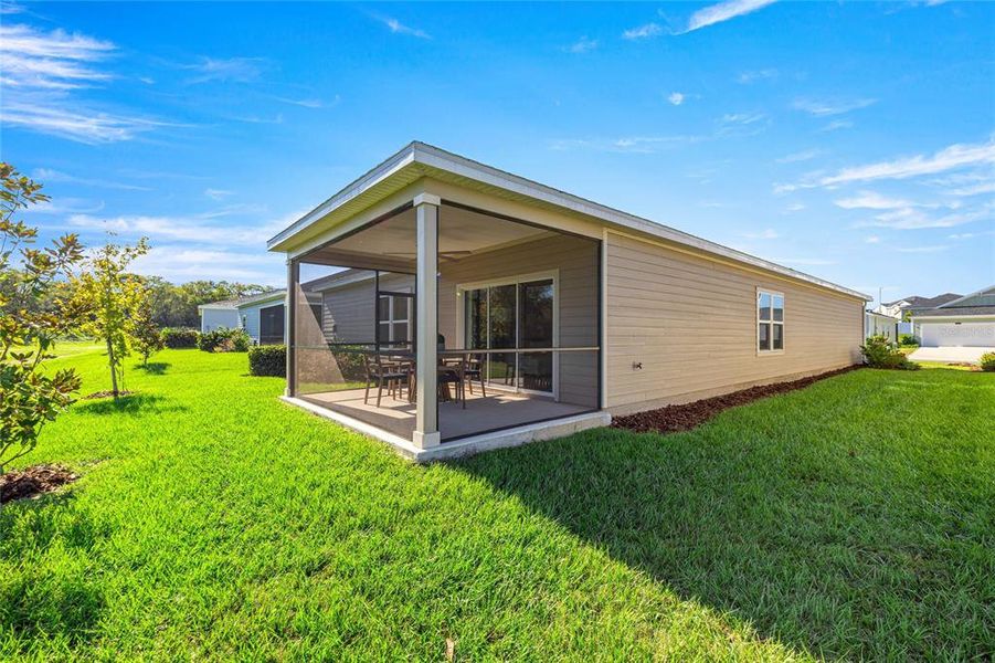 Exterior details and patio area of a home in Pioneer Ranch: Pioneer Ranch 50's, Ocala (Image 3). Exterior details and patio area of a home in Pioneer Ranch: Pioneer Ranch 50's, Ocala (Image 3).