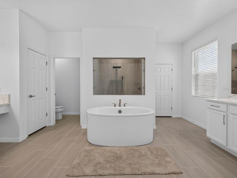 Furnished interior view inside a new home in Storey Creek, Kissimmee (Image 11).