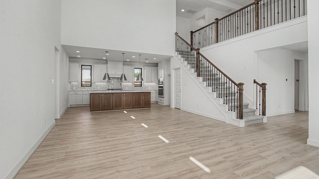 Spacious, unfurnished interior of a new home in Sienna, Missouri City (Image 7).