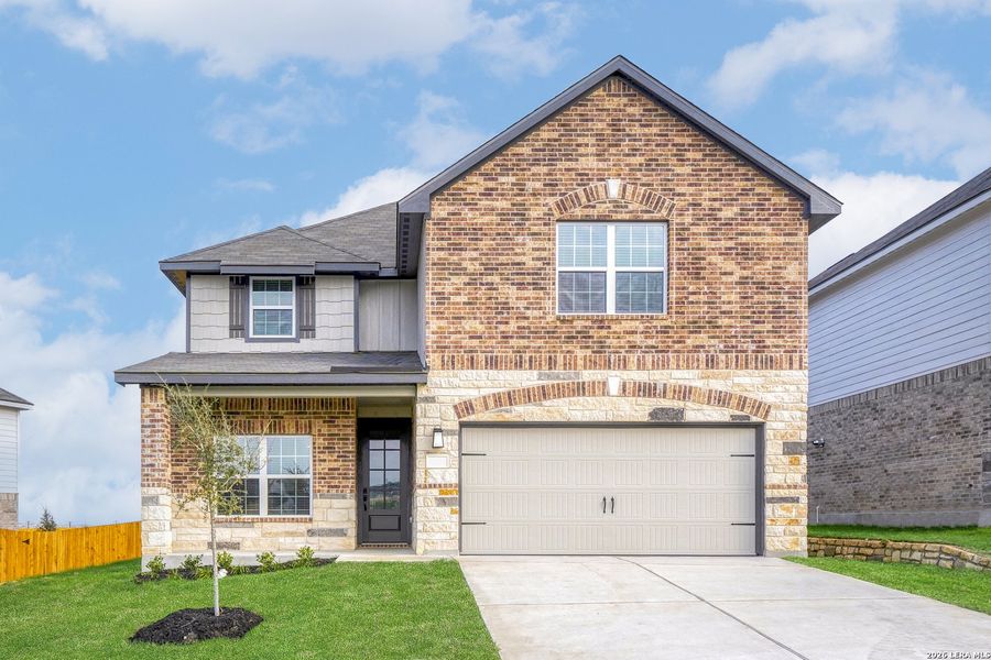 Front exterior of a new home in Hightop Ridge, Converse, TX, highlighting curb appeal (Image 1). Front exterior of a new home in Hightop Ridge, Converse, TX, highlighting curb appeal (Image 1).