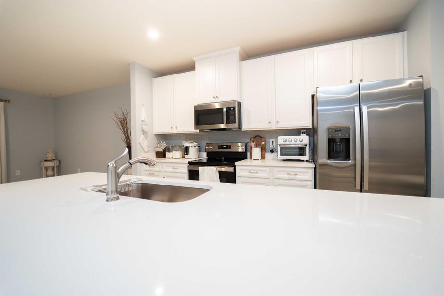 Furnished interior view inside a new home in Central Park Villas, Port St. Lucie (Image 6). Furnished interior view inside a new home in Central Park Villas, Port St. Lucie (Image 6).