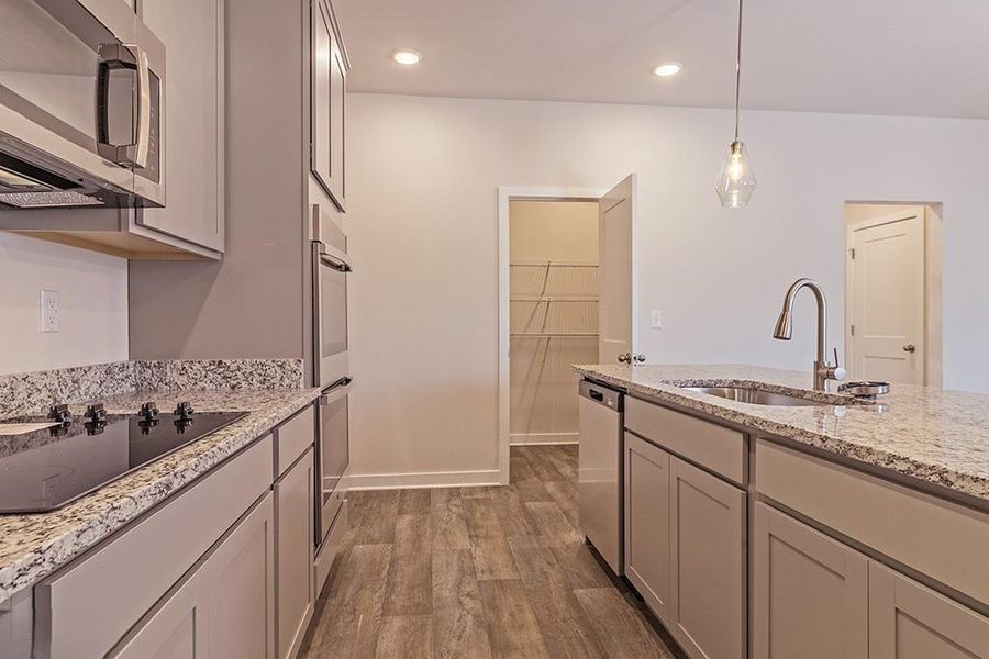 Furnished interior view inside a new home in Fern Dale, Fairburn (Image 6).