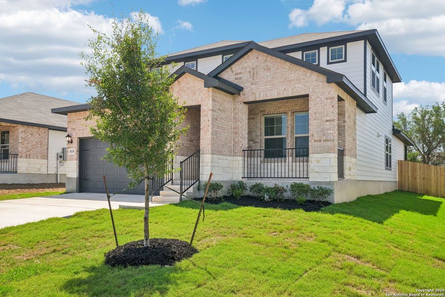 Front exterior of a new home in Royal Crest, San Antonio, TX, highlighting curb appeal (Image 21). Front exterior of a new home in Royal Crest, San Antonio, TX, highlighting curb appeal (Image 21).