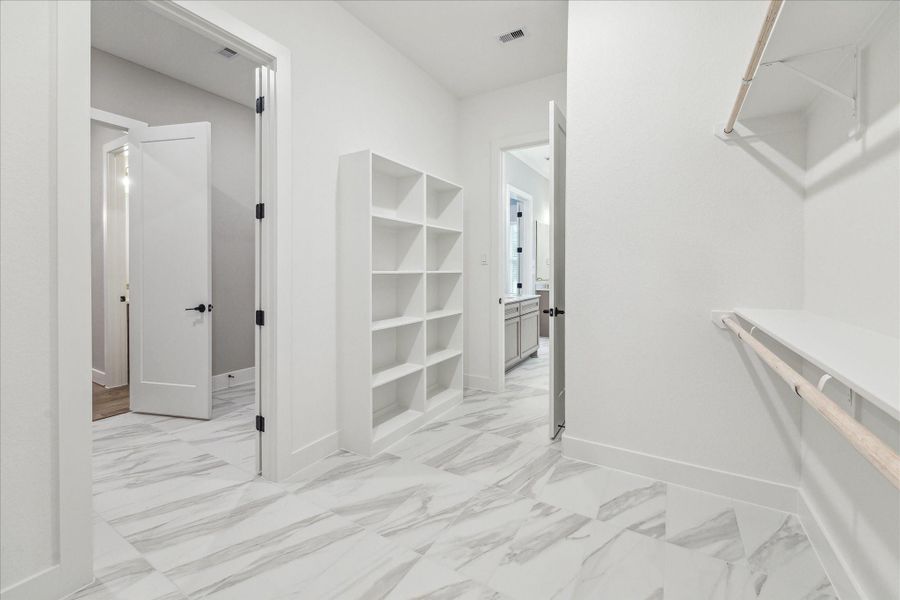 THE PICTURE SHOWN IS NOT THE ACTUAL HOME. TRINITY SIGNATURE HOMES IS BUILDING A SIMILAR FLOOR PLAN.