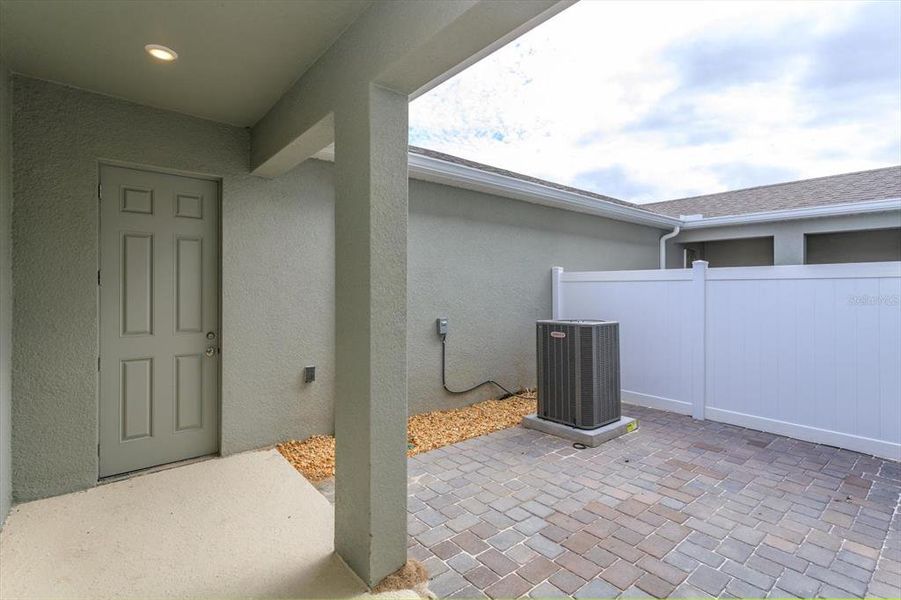 Exterior details and patio area of a home in Serenade at Ovation, Winter Garden (Image 3).