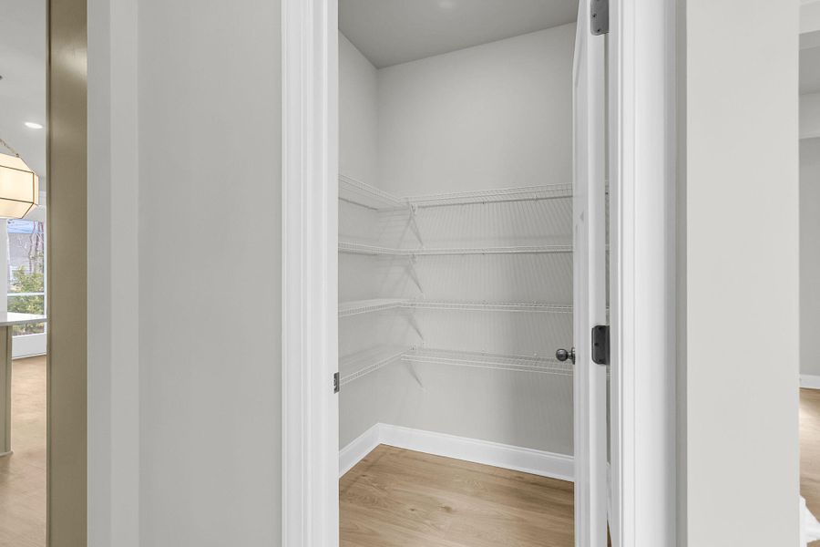 Spacious, unfurnished interior of a new home in Tidewater at Lakes of Cane Bay, Summerville (Image 38).