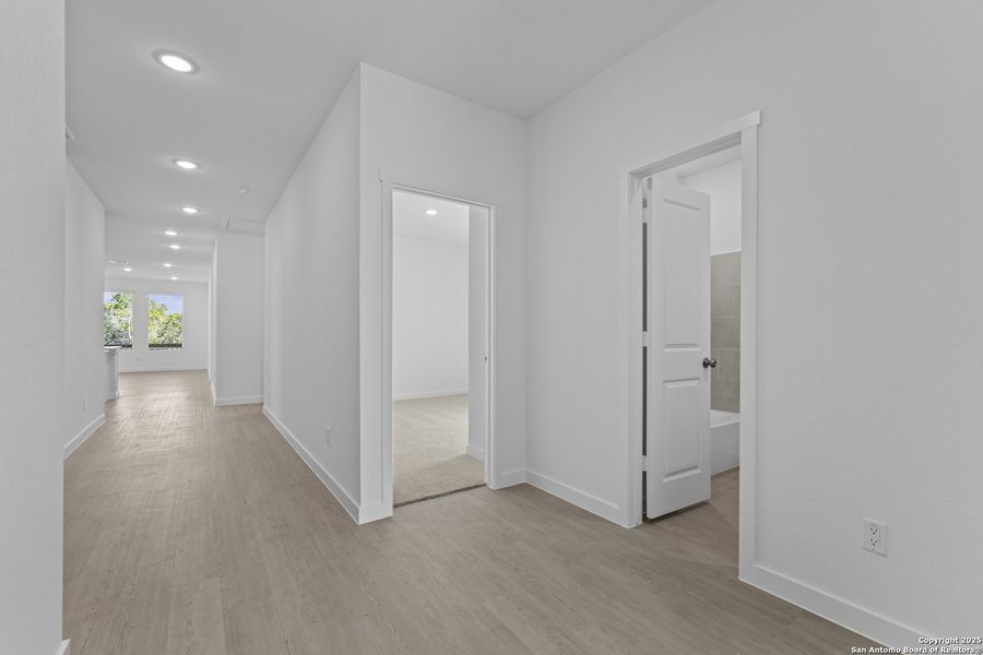 Spacious, unfurnished interior of a new home in Waterwheel: Coastline Collection, San Antonio (Image 20).