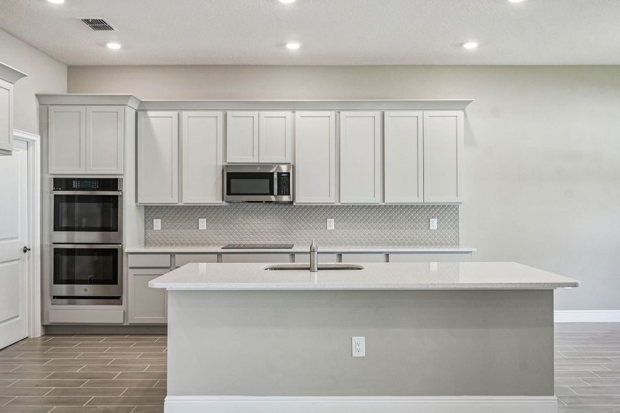 Furnished interior view inside a new home in Pinecone Reserve, Brooksville (Image 7).
