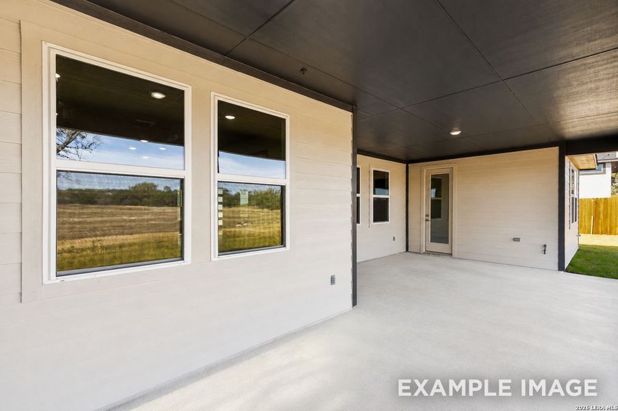 Exterior details and patio area of a home in Potranco Oaks, Castroville (Image 3).