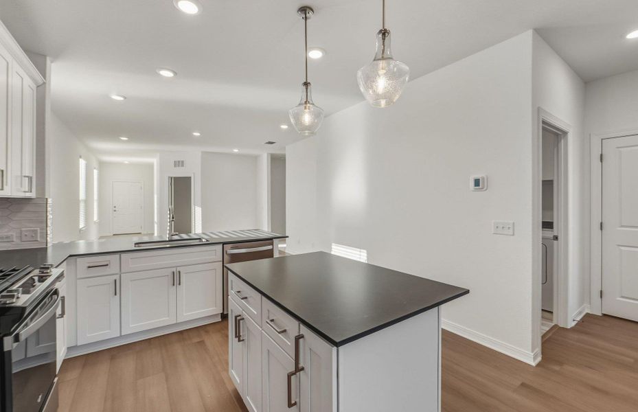 Furnished interior view inside a new home in Crosswinds, Kyle (Image 7).