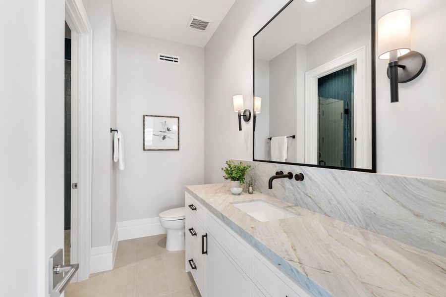 Guest bath with timeless finishes.