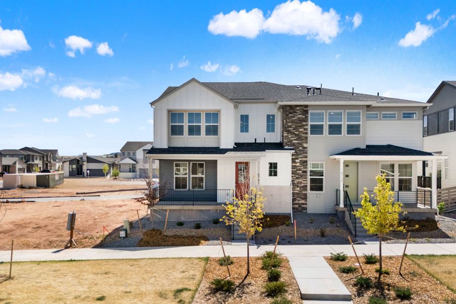 Front exterior of a new home in Trumark Homes at Sterling Ranch, Littleton, CO, highlighting curb appeal (Image 22).
