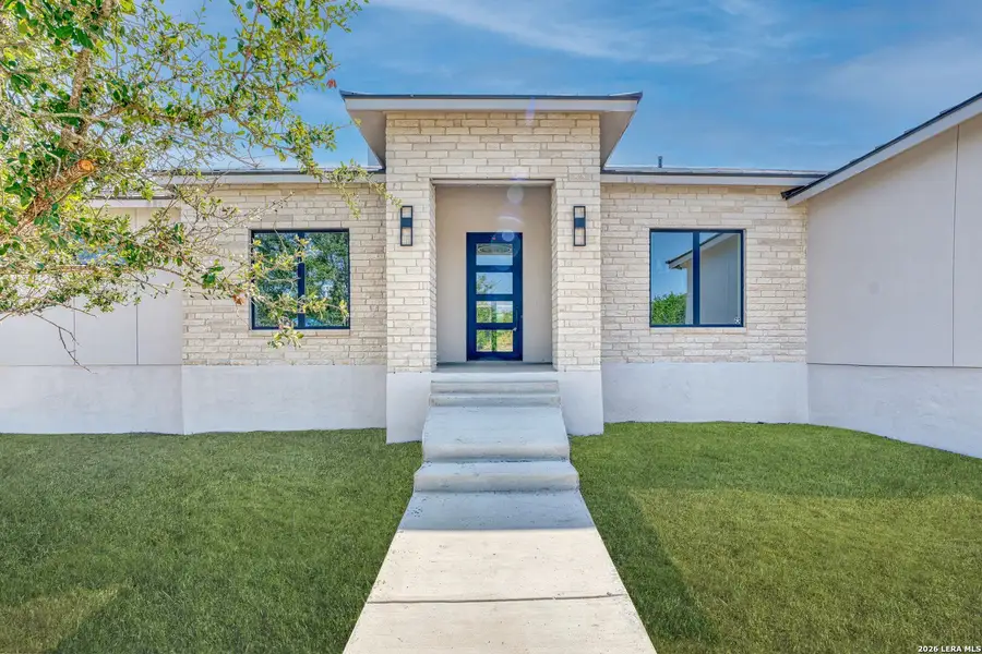 Exterior details and patio area of a home in , New Braunfels (Image 3).