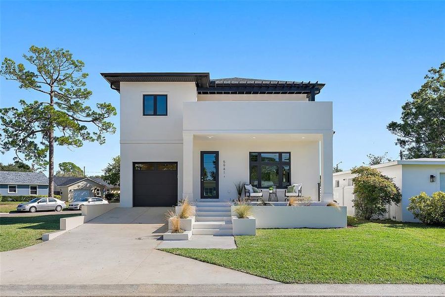 Front exterior of a new home in , St. Petersburg, FL, highlighting curb appeal (Image 27).