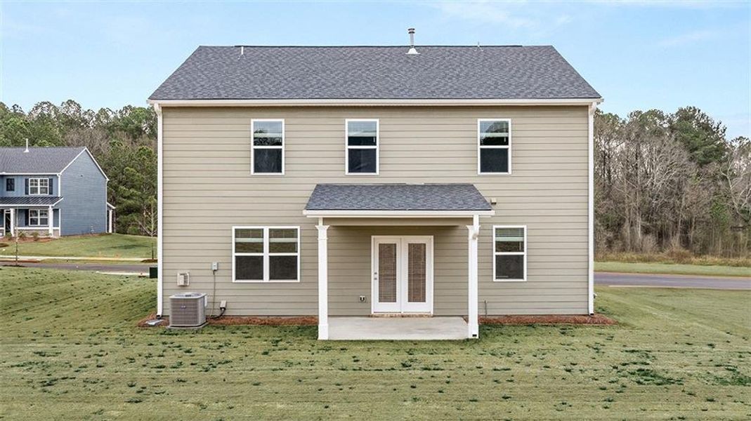 Exterior details and patio area of a home in Twin Lakes, Hoschton (Image 2).
