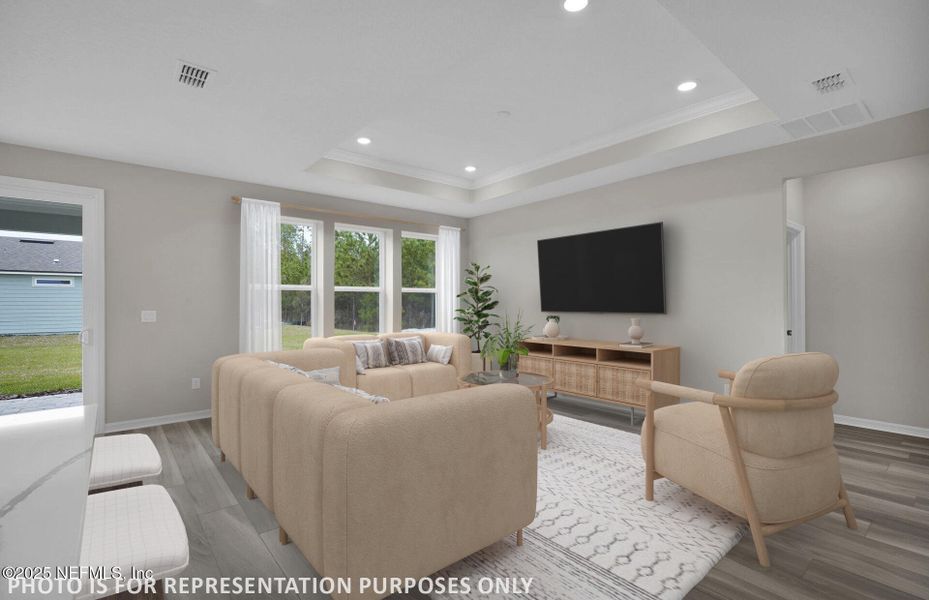 Furnished interior view inside a new home in Del Webb Wildlight, Yulee (Image 10).