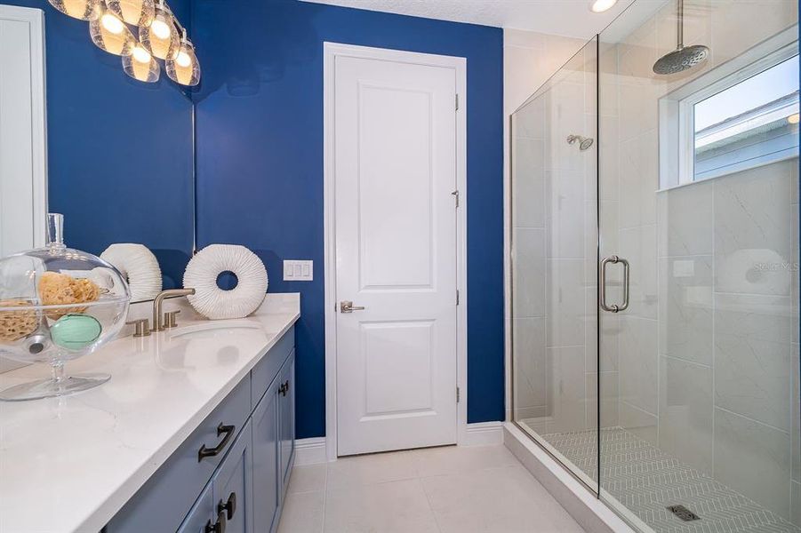 Furnished interior view inside a new home in Serenade at Ovation, Winter Garden (Image 15).