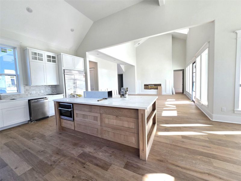 Kitchen Island with custom cabinetry and microwave.