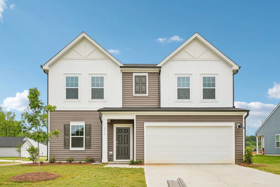 Front exterior of a new home in Middleton Farms, Middlesex, NC, highlighting curb appeal (Image 1). Front exterior of a new home in Middleton Farms, Middlesex, NC, highlighting curb appeal (Image 1).