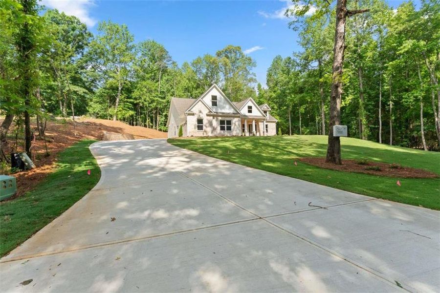 Front exterior of a new home in , Maysville, GA, highlighting curb appeal (Image 28).