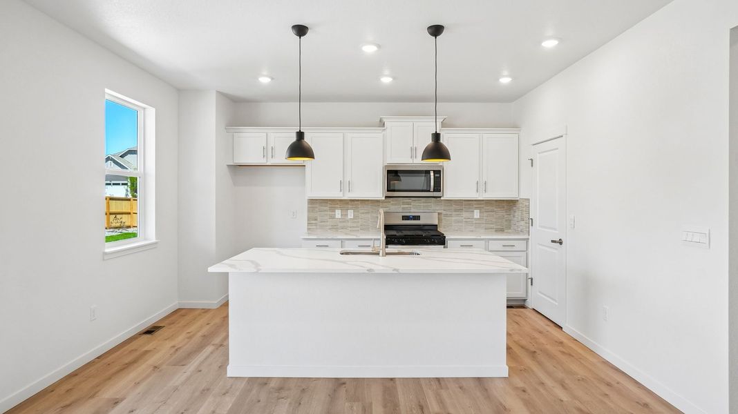 Furnished interior view inside a new home in Trails at Crowfoot, Parker (Image 4).