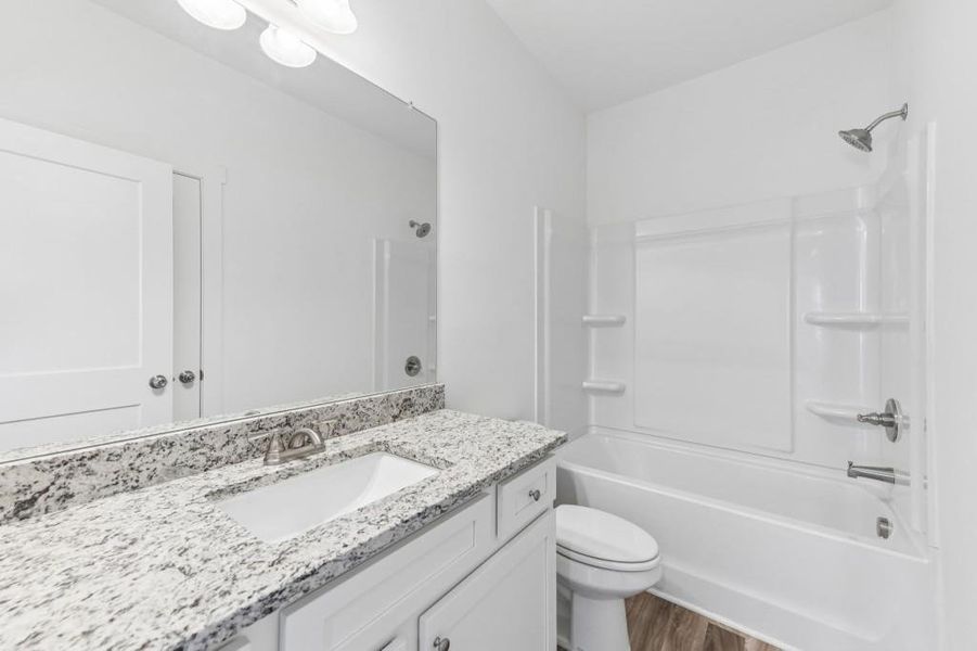 Furnished interior view inside a new home in Sutton’s Landing, Statham (Image 15).