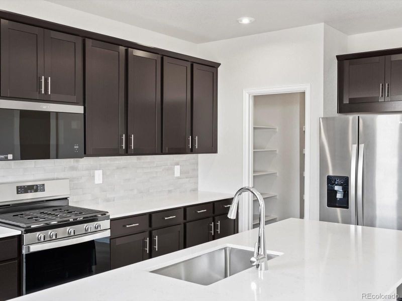 Furnished interior view inside a new home in Poudre Heights: The Alpine Collection, Windsor (Image 14).