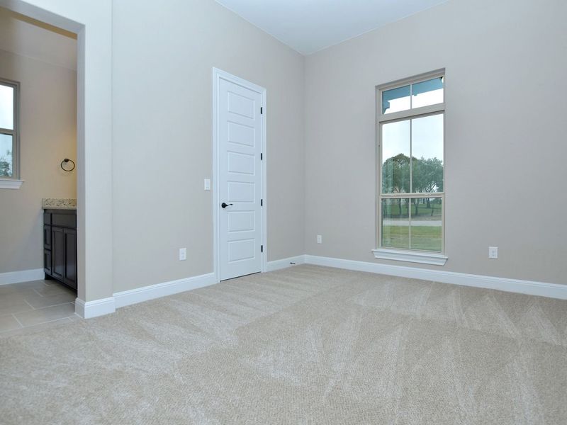 Representative unfurnished interior of a home built from the Madera II by Giddens Homes in Scofield Farms Estates, Georgetown (Image 418).