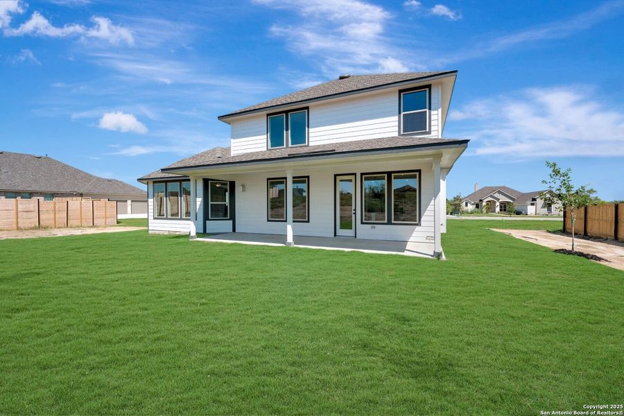 Front exterior of a new home in Everly Estates, San Antonio, TX, highlighting curb appeal (Image 15). Front exterior of a new home in Everly Estates, San Antonio, TX, highlighting curb appeal (Image 15).