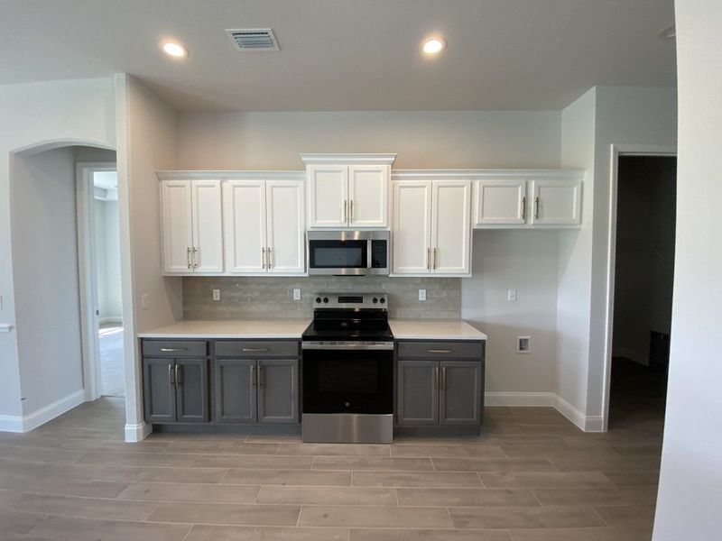 Representative furnished interior of a home built from the Oakmont by Paytas Homes in The Reserve at Victoria, Deland (Image 6).