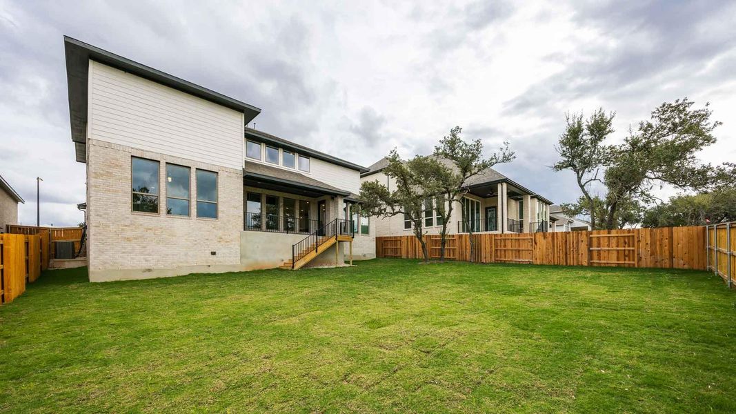 Exterior details and patio area of a home in Parkside On The River West 60', Georgetown (Image 3). Exterior details and patio area of a home in Parkside On The River West 60', Georgetown (Image 3).