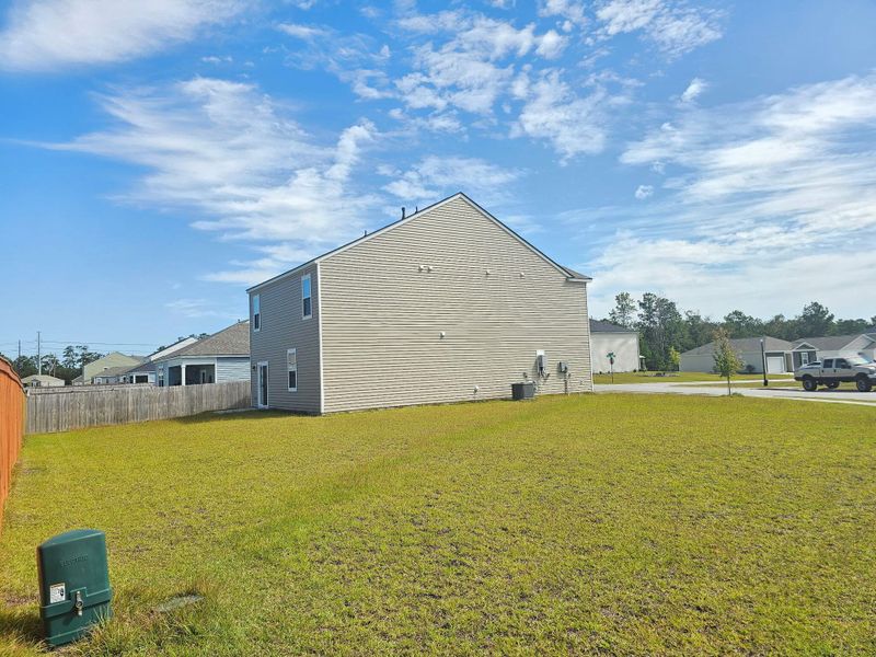 Front exterior of a new home in , Ladson, SC, highlighting curb appeal (Image 25).
