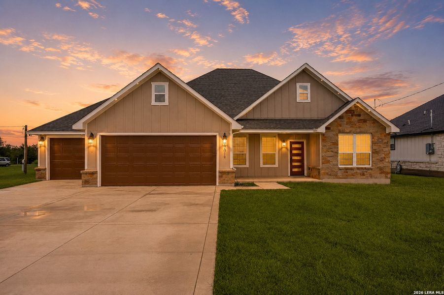 Front exterior of a new home in , Atascosa, TX, highlighting curb appeal (Image 1). Front exterior of a new home in , Atascosa, TX, highlighting curb appeal (Image 1).