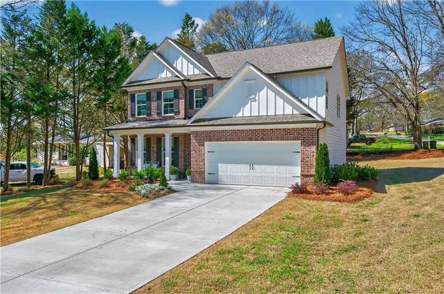 Front exterior of a new home in , Jefferson, GA, highlighting curb appeal (Image 26).