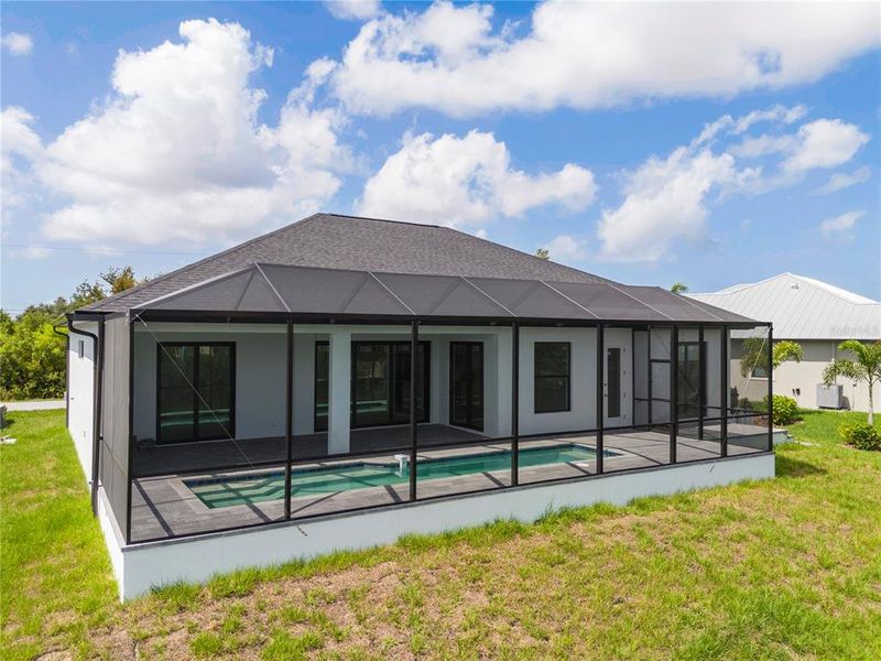 Exterior details and patio area of a home in , Port Charlotte (Image 2). Exterior details and patio area of a home in , Port Charlotte (Image 2).