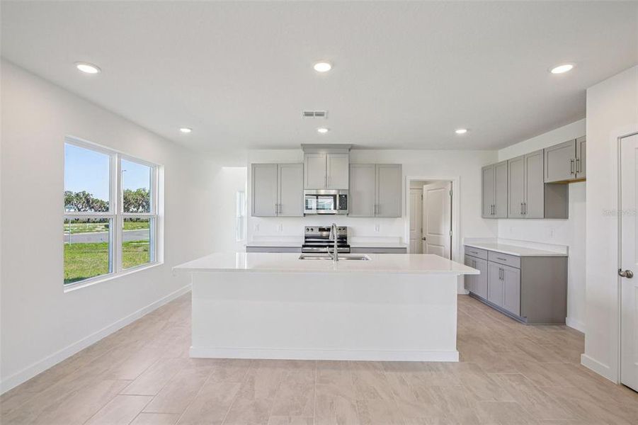 Furnished interior view inside a new home in Willowbrook North, Winter Haven (Image 8).
