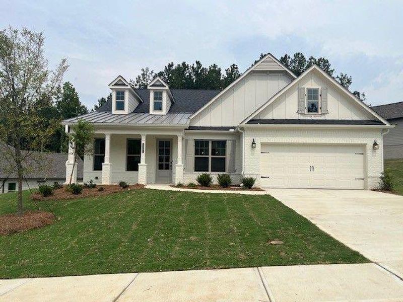 Front exterior of a new home in Soleil Belmont Park, Canton, GA, highlighting curb appeal (Image 2). Front exterior of a new home in Soleil Belmont Park, Canton, GA, highlighting curb appeal (Image 2).
